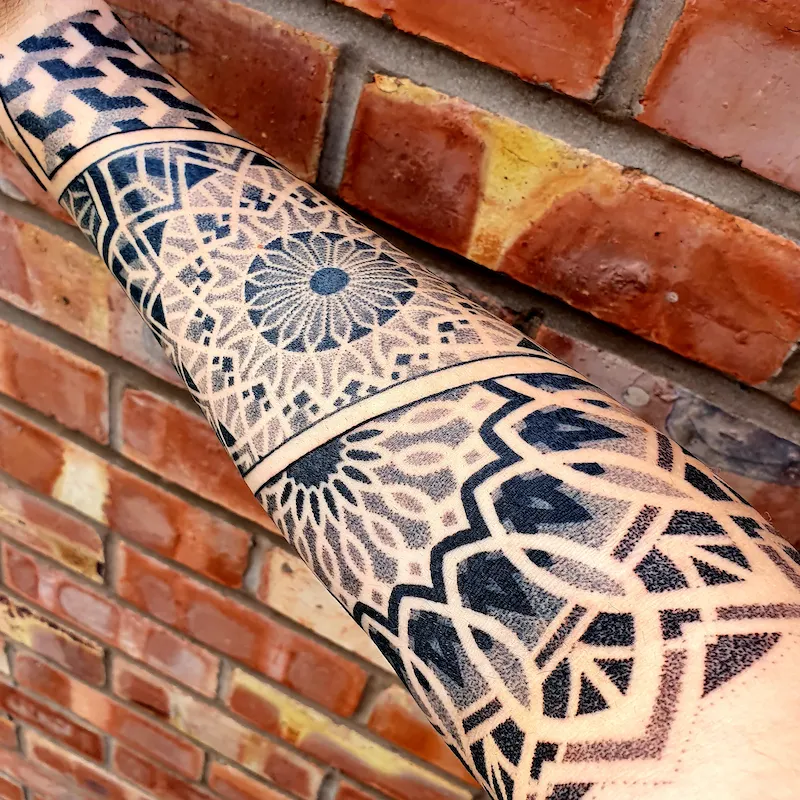 forearm dotwork tattoo