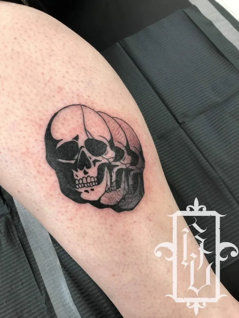 skulls tattoo by corey veron black