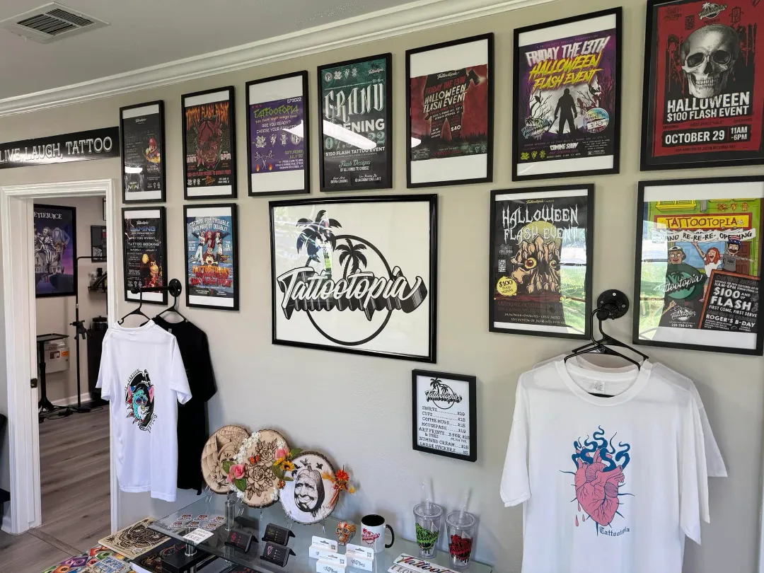 tattootopia front lobby wall with posters tshirts