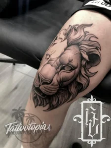 lion leg tattoo roger cazares tattootopia