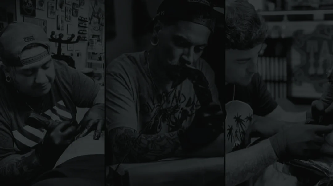 tattoo artists in action