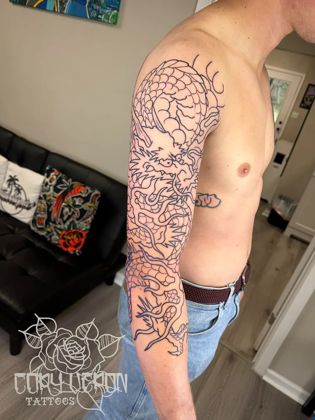 black and gray angel ornate cross sleeve arm tattoo cory veron tattootopia