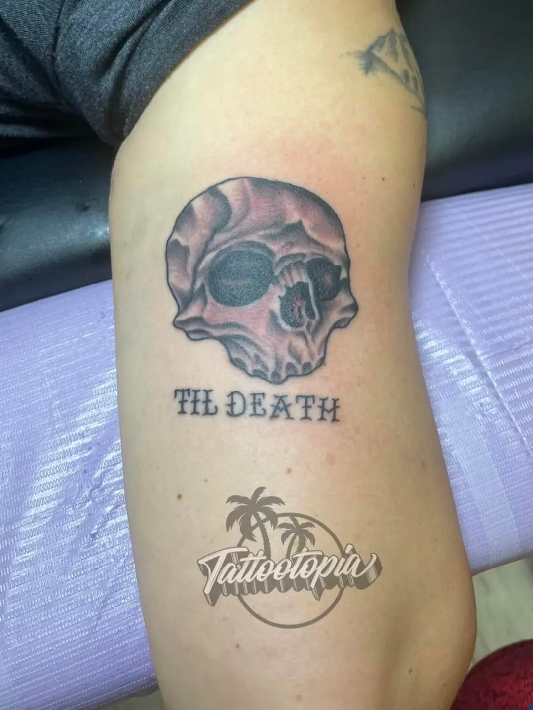 black and gray angel statue dove clouds sleeve arm tattoo cory veron tattootopia