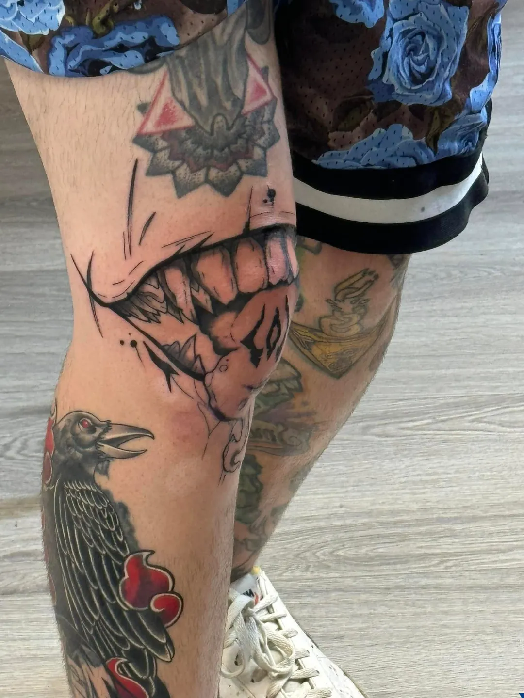 black and gray demon mouth teeth knee tattoo cory veron tattootopia