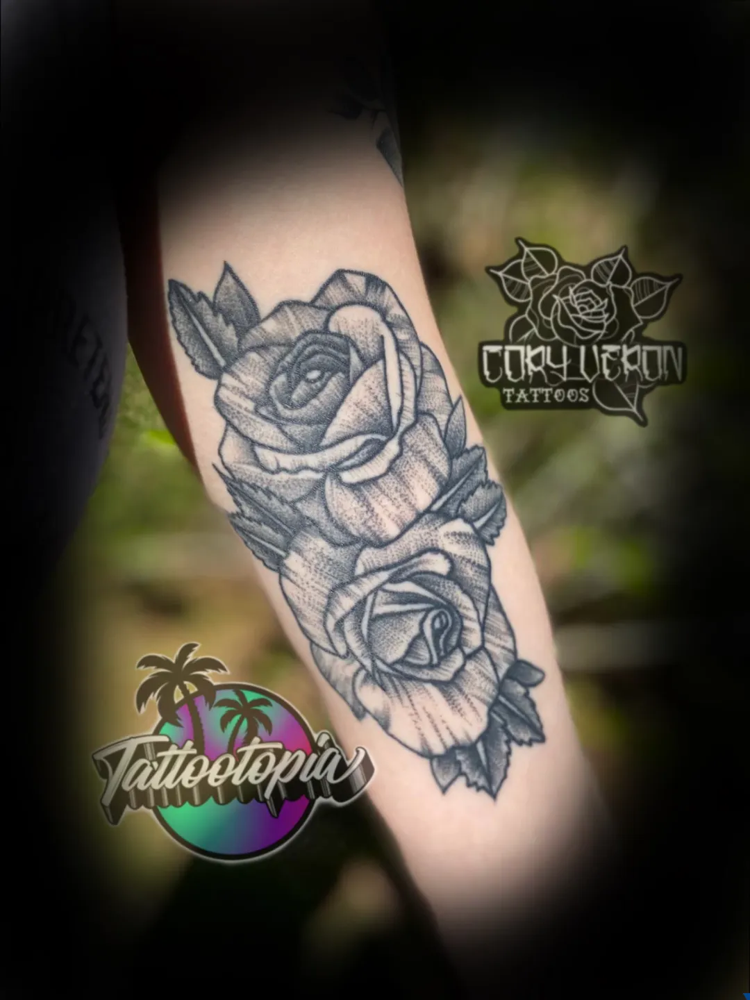 black and gray double rose forearm tattoo cory veron tattootopia