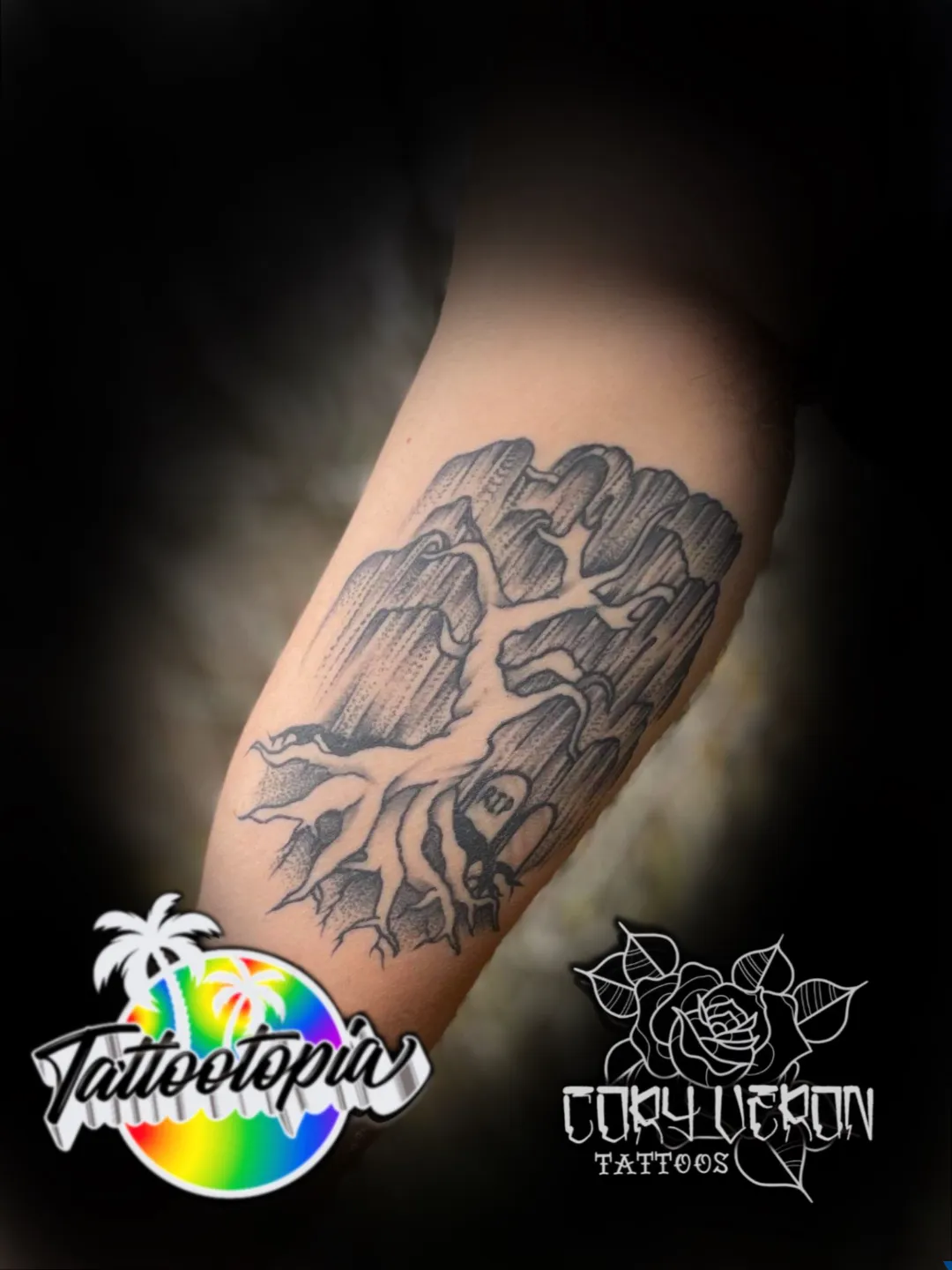 black and gray tree roots leg tattoo cory veron tattootopia