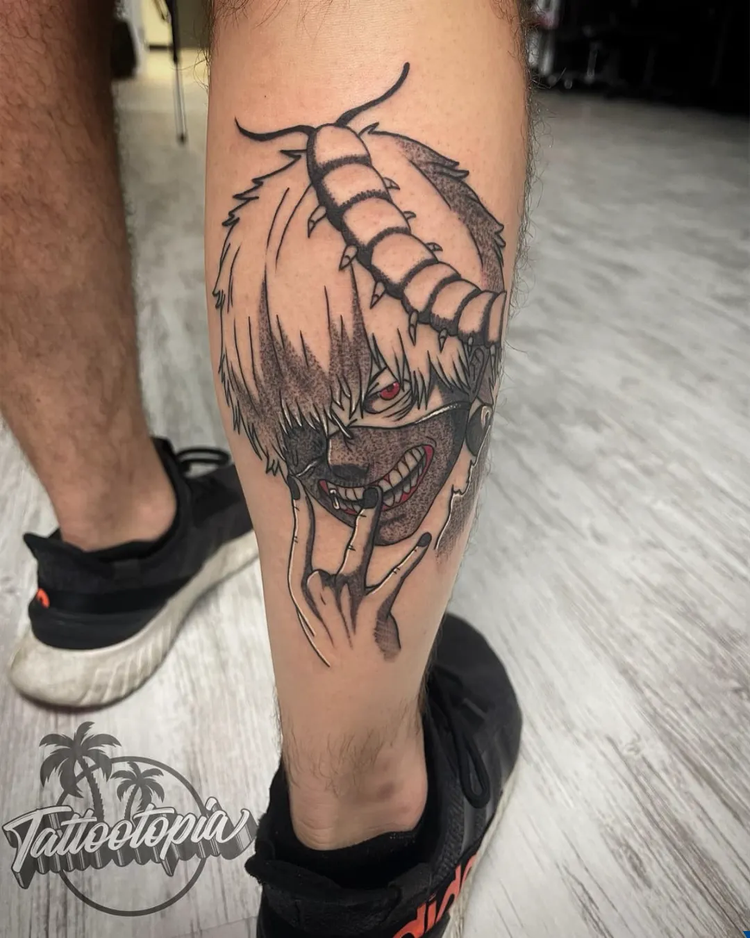 black and gray woman portrait headdress arm tattoo cory veron tattootopia