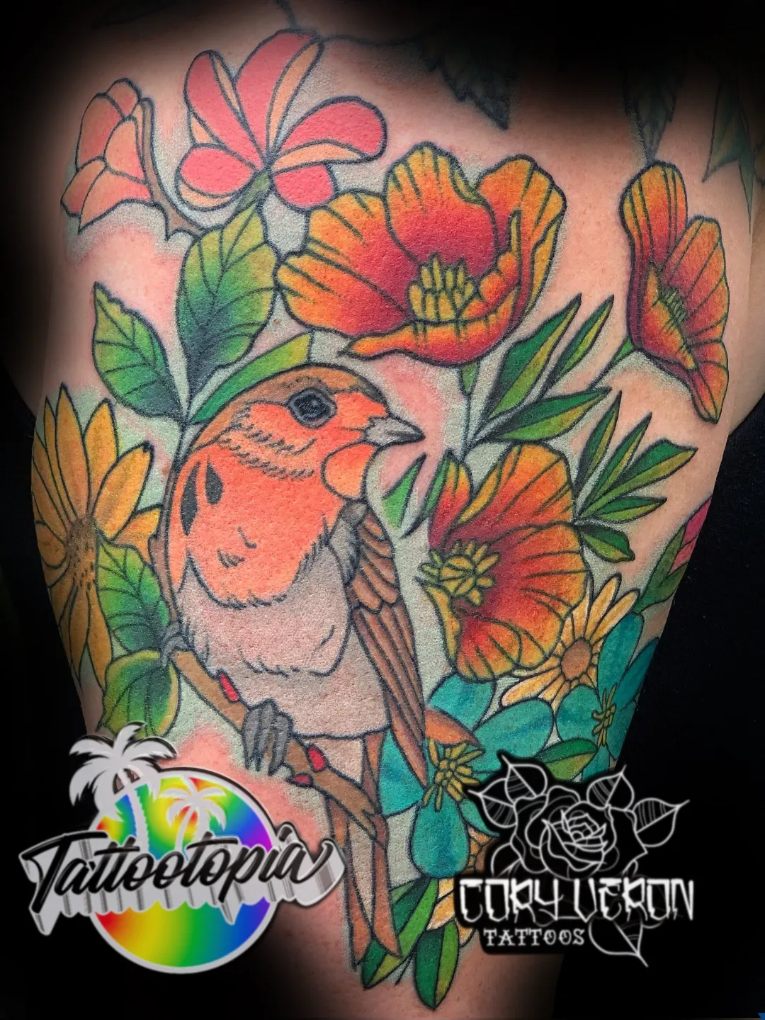 color bird among flower chest piece tattoo cory veron tattootopia