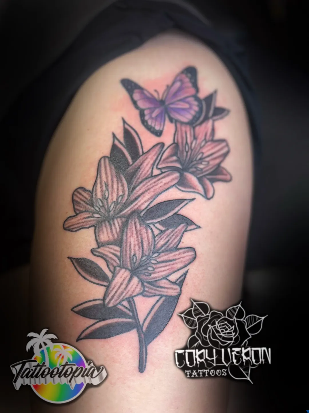 purple butterfly and lily flowers arm tattoo cory veron tattootopia