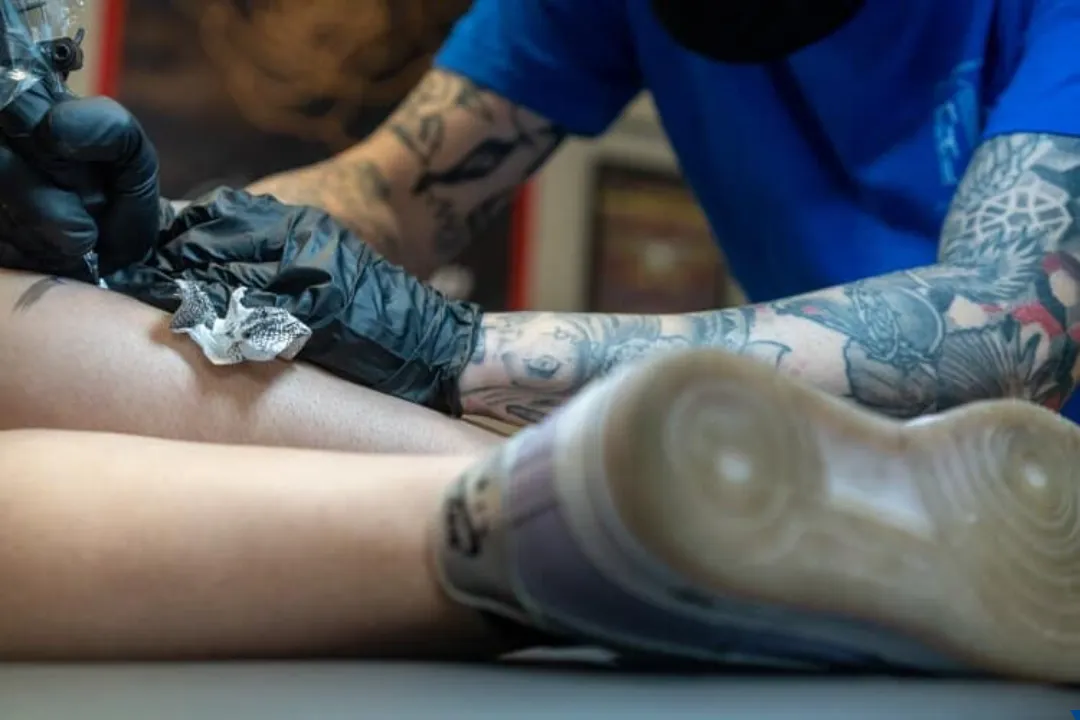 tattoo artist at work cory veron tattootopia denham springs