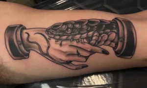 black and gray armored hands forearm tattoo josh lockhart tattootopia