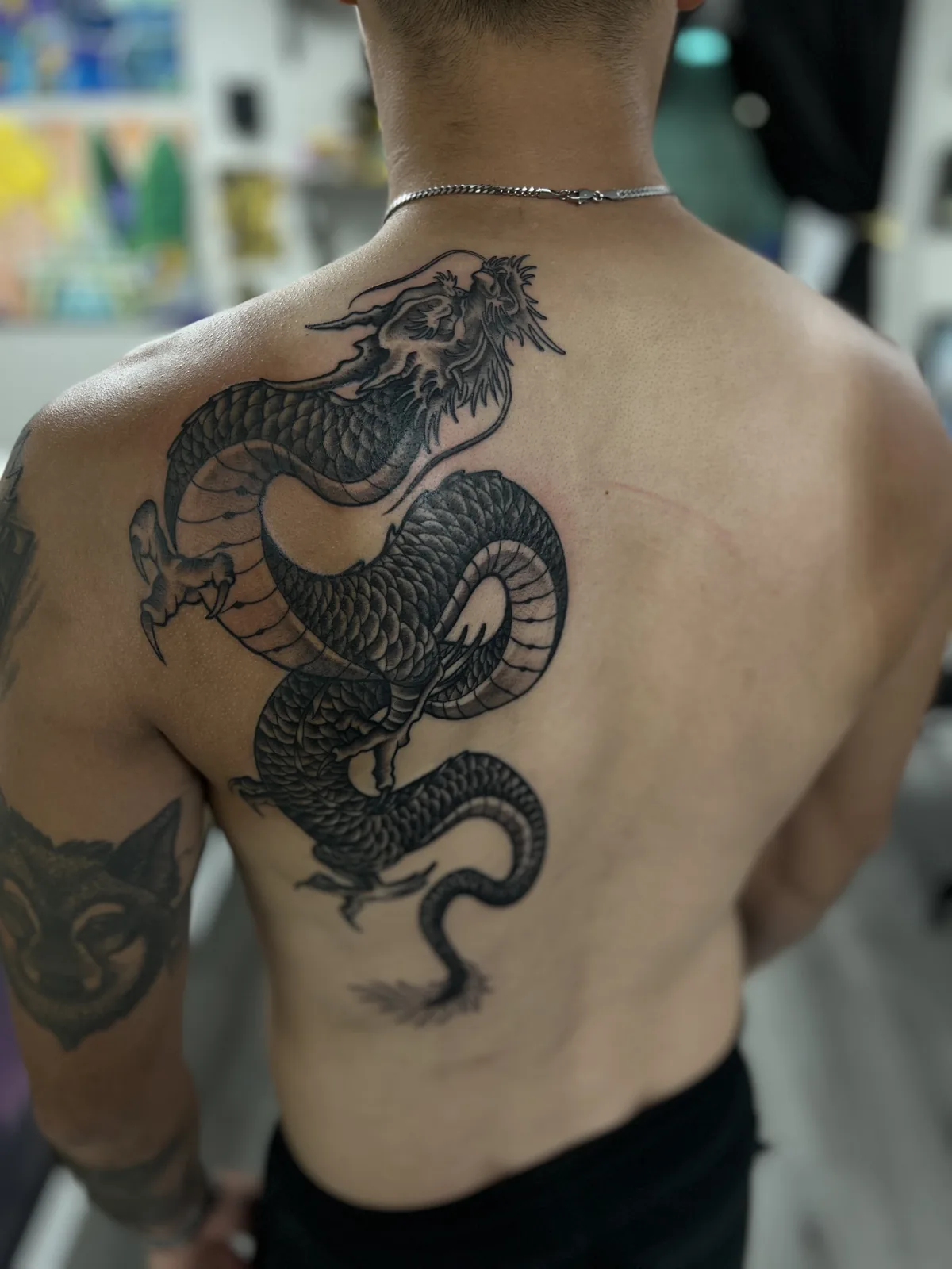 black and gray dragon back tattoo jeff thibodaux tattootopia