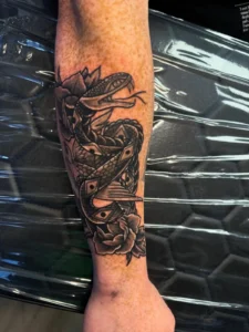 black and gray dragon forearm tattoo josh lockhart tattootopia
