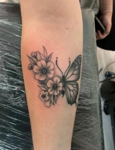 black and gray flowers and butterfly forearm tattoo halo minier tattootopia
