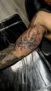 black and gray ornamental sleeve arm tattoo jeff thibodaux tattootopia