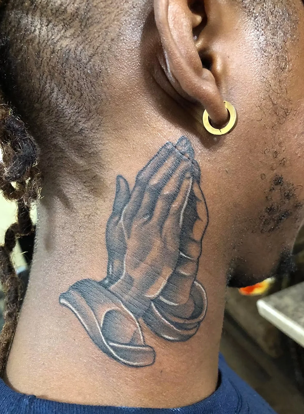 black and gray praying hands neck tattoo halo minier tattootopia