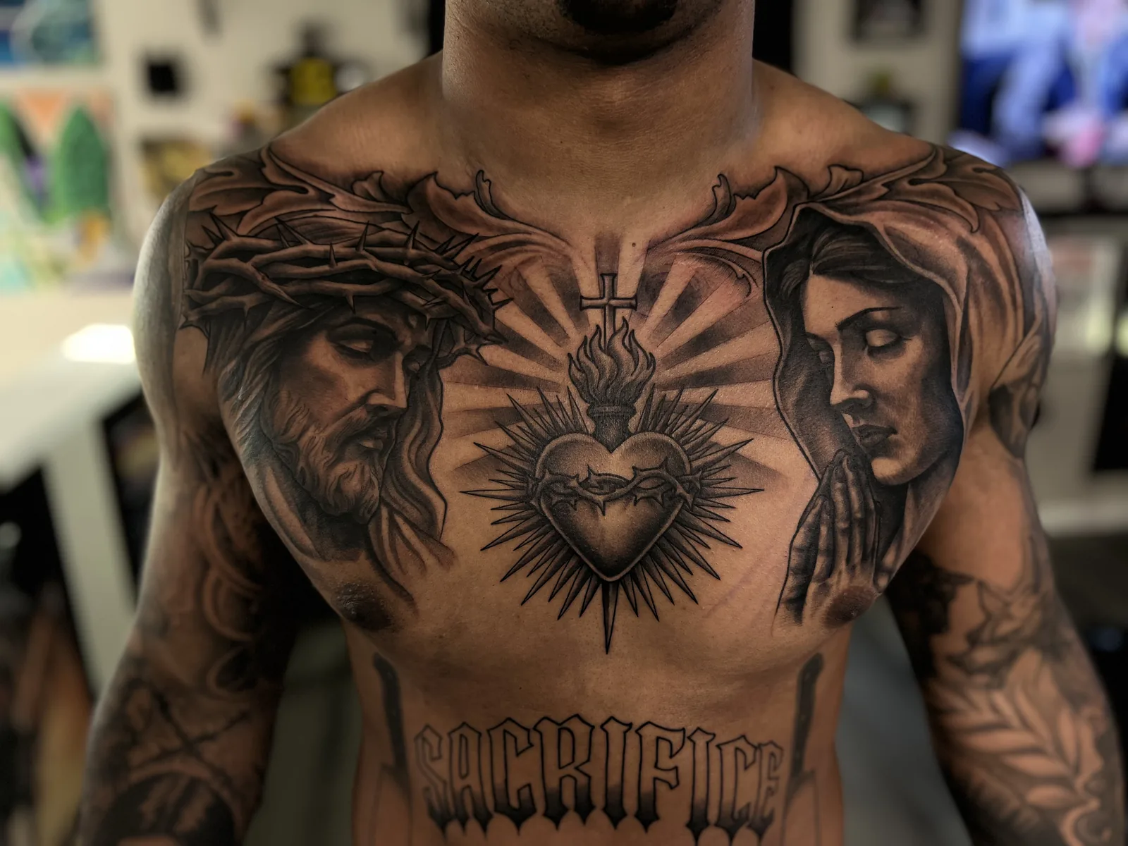 black and gray religious chest tattoo jeff thibodaux tattootopia