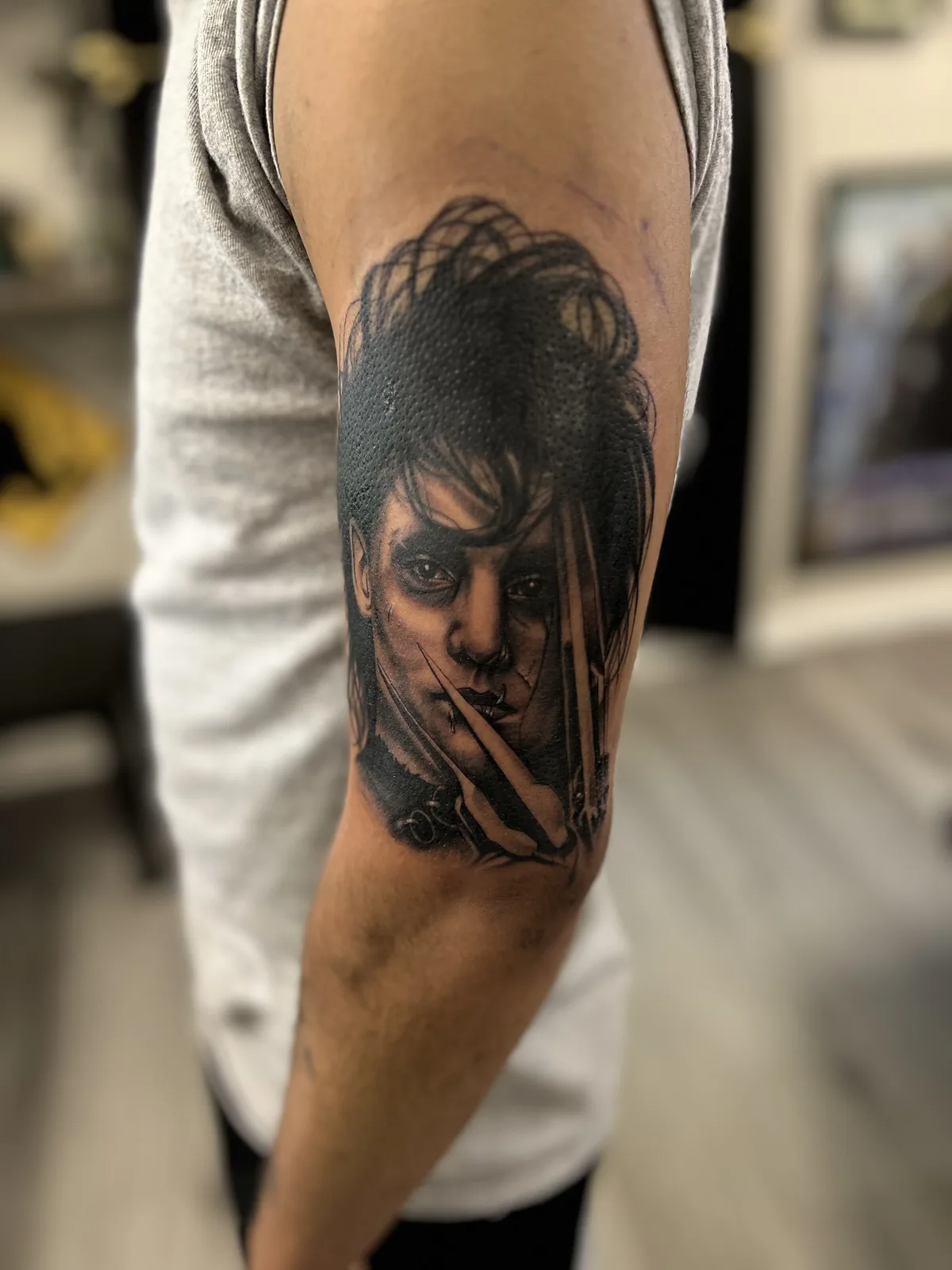 black and gray woman portrait arm tattoo jeff thibodaux tattootopia