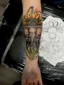 color elephant and sunflower forearm tattoo jeff thibodaux tattootopia