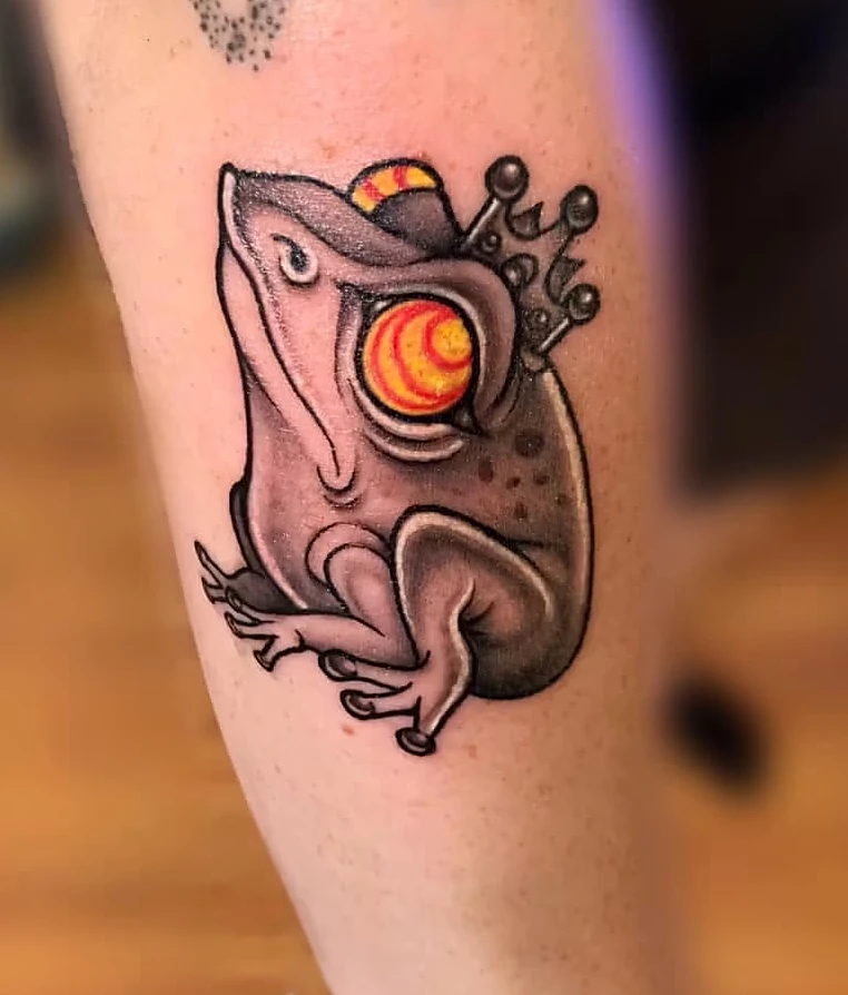color frog with glowing orb arm tattoo halo minier tattootopia