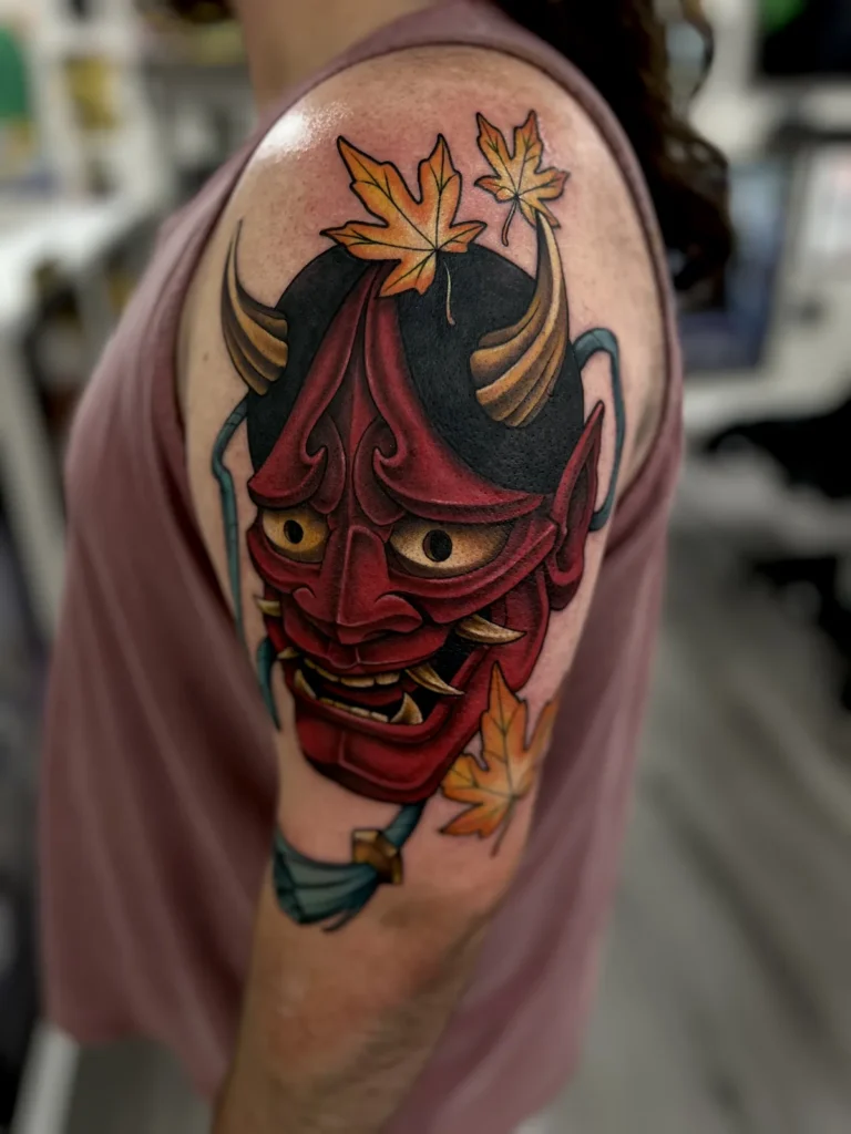 Color Japanese Hannya mask shoulder tattoo by Jeff Thibodaux at Tattootopia in Denham Springs