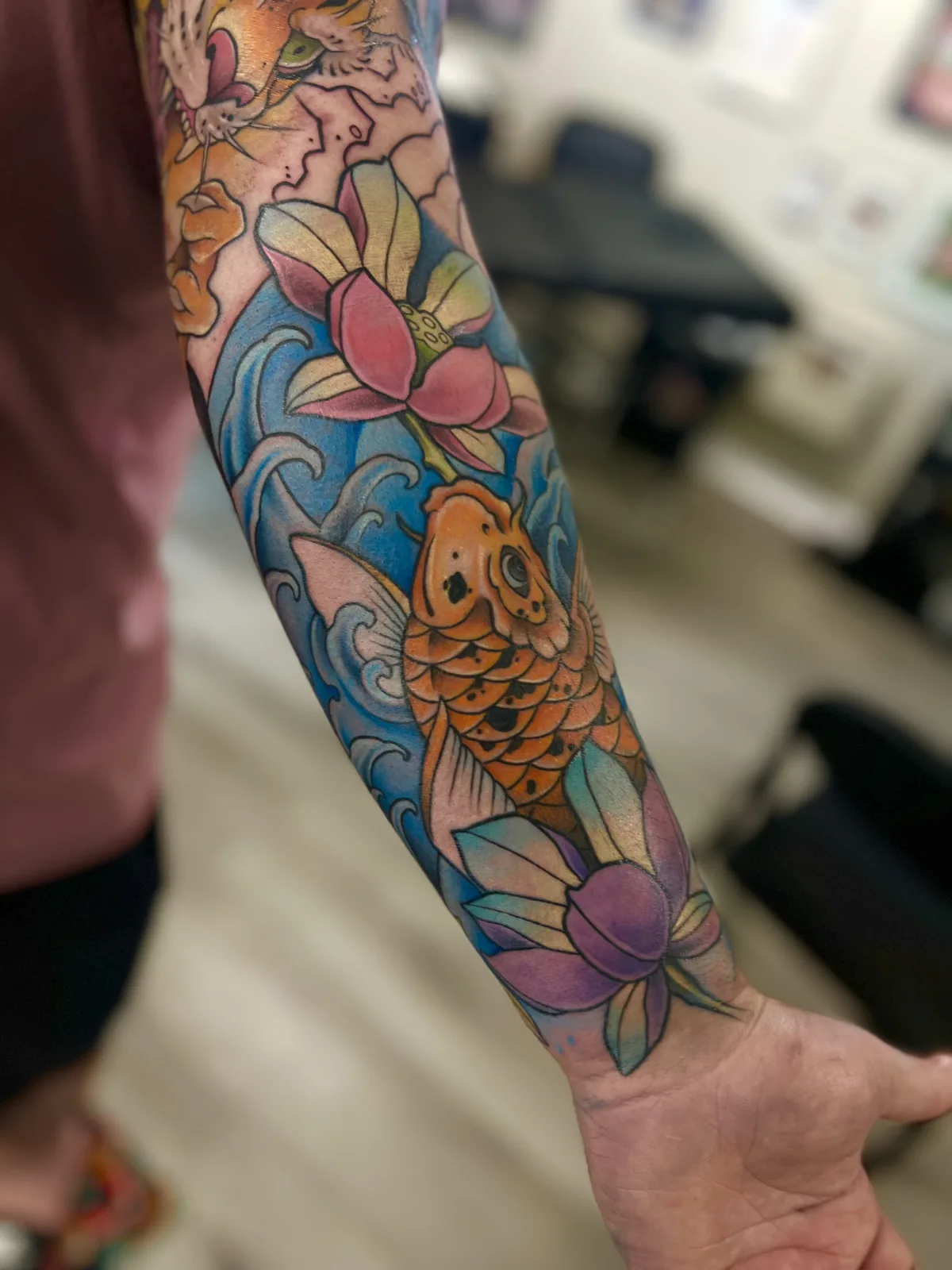 color japanese koi and lotus sleeve tattoo jeff thibodaux tattootopia