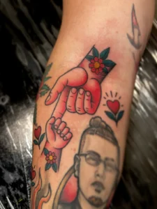 color traditional hand and portrait arm tattoo jeff thibodaux tattootopia