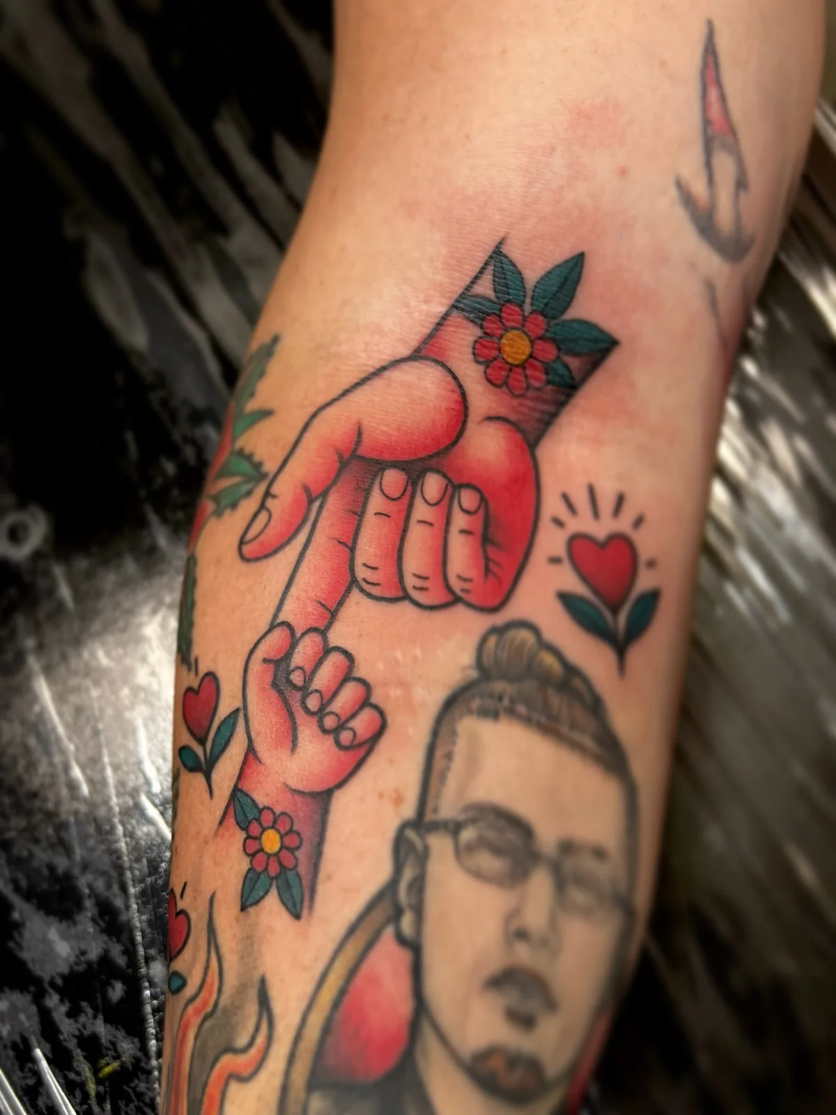 color traditional hand and portrait arm tattoo jeff thibodaux tattootopia