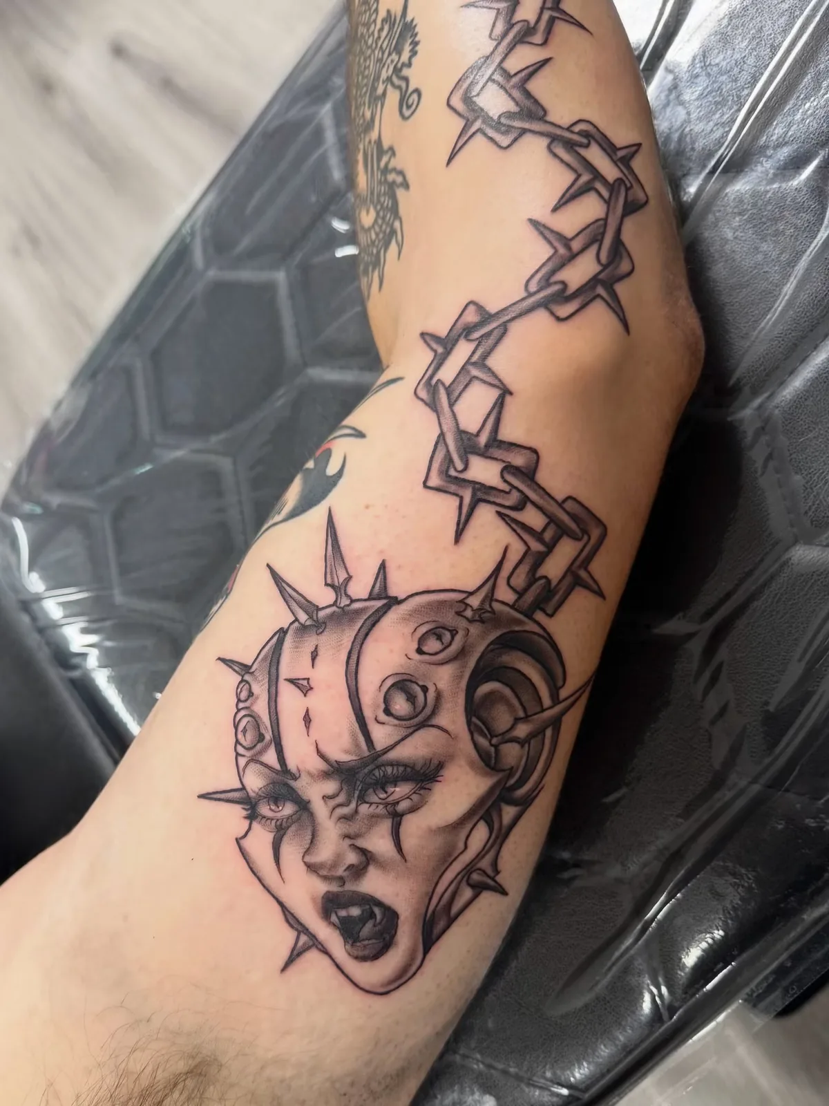 neo traditional snake and woman face forearm tattoo josh lockhart tattootopia