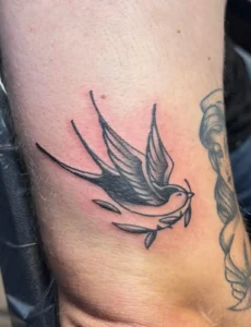 traditional swallow ribs tattoo josh lockhart tattootopia